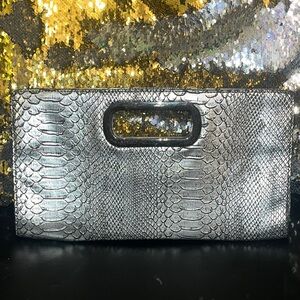 #30-Express shinny silver handbag. magnetic closure, Man-made materials